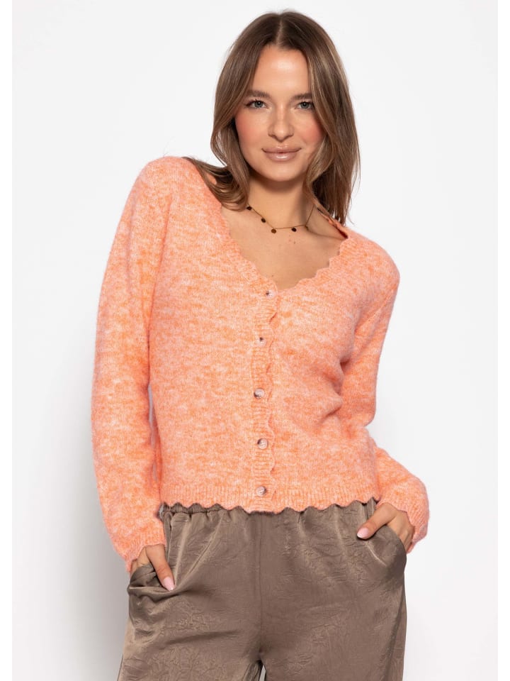 Strickjacke mit Bogenkante in Koralle