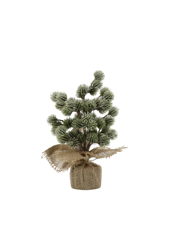 Künstllicher Zedernbaum mit Schnee in grün