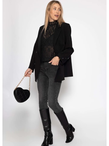 SASSYCLASSY Spitzen-Top mit Stehkragen in Schwarz