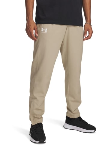 Under Armour Trainingshose "Rival Woven Windbreaker Pant" in Braun