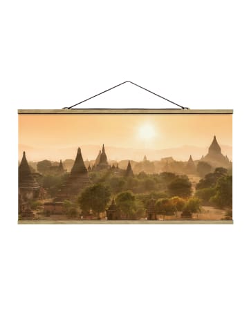 WALLART Stoffbild mit Posterleisten - Sonnenuntergang über Bagan in Orange