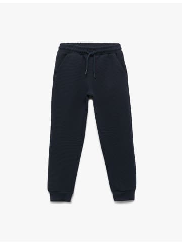 KOTON SWEAT BOTTOMS in Marineblau