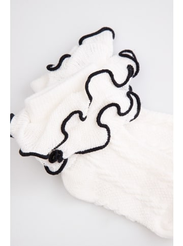 Coccodrillo Socken in ecru