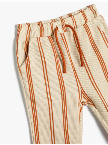 KOTON Sweat Bottoms in Ekru Gestreift