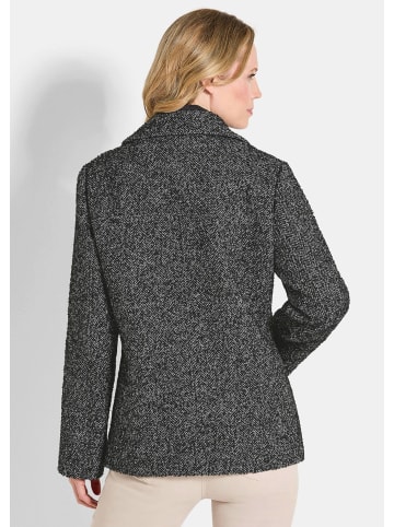 GOLDNER Kurzgröße:  Bouclé-Jacke Moderne Wolljacke mit Steppeinsatz in schwarz / weiß / gemustert