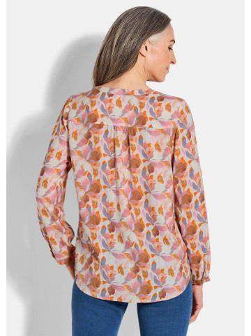 GOLDNER Kurzgröße:  Florale Druckbluse mit V-Ausschnitt in orange / gemustert