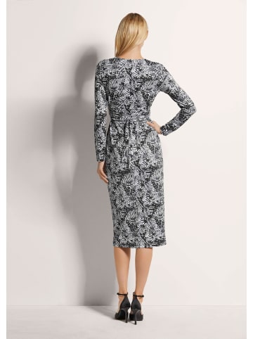 MADELEINE Wickelkleid mit taillierter Silhouette in schwarz / wollweiß