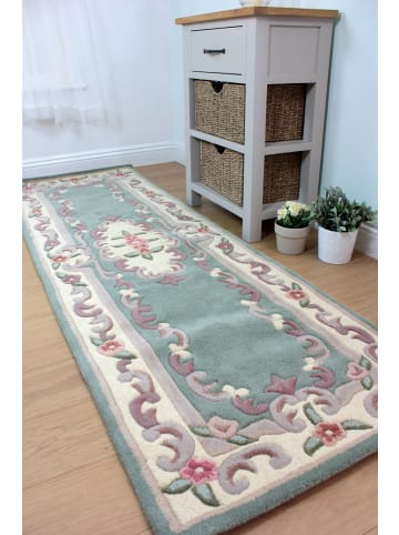 KADIMA DESIGN Traditioneller Wollteppich mit handgeschnitzten Details in Grün-Beige