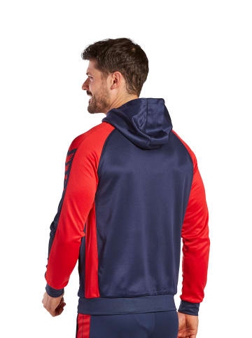 erima Six Wings Trainingsjacke mit Kapuze in new navy/rot