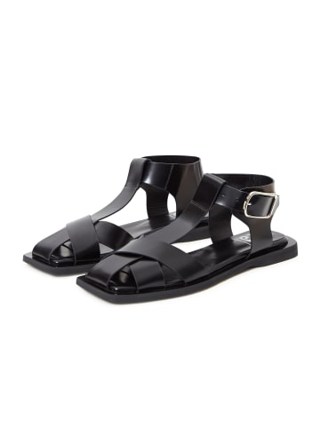 CESARE GASPARI Leder Knöchelmanschette Flache Sohle Sandalen in Schwarz