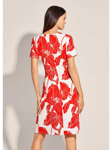 MADELEINE Kleid in Wickel-Optik mit großem Blütenprint in koralle / creme