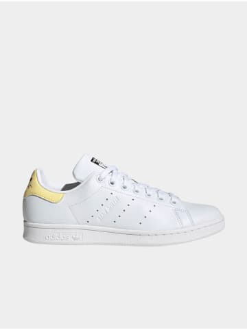 adidas Turnschuhe in white/almost yellow/core black