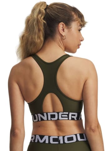 Under Armour Sport-BH "Heatgear Mid Branded" in Grün