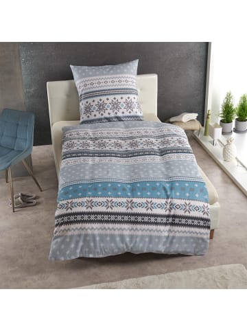 Traumschlaf Bettwäsche Schneeflocken in blau