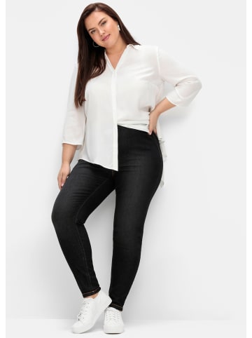 sheego Jeggings in black denim