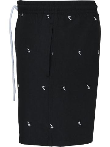 Urban Classics Badeshorts in black/palmtree