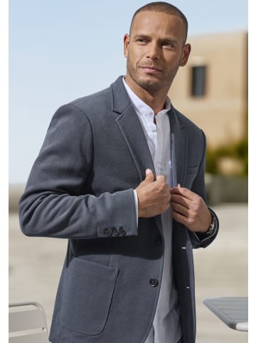 John Devin Sakko in navy