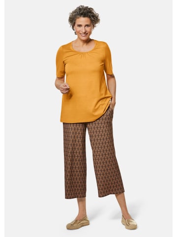 GOLDNER Kurzgröße:  Attraktive Druckhose Louisa mit weichem Fall in schwarz / milchkaffee