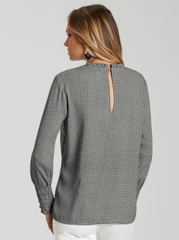 creation L Rüschenbluse in schwarz-weiß-gemustert