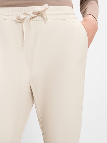 comma Lederhose in sand