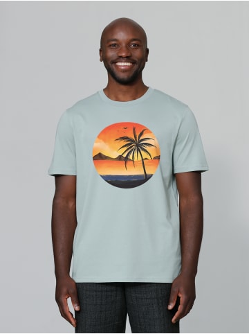wat? Apparel T-Shirt Sunset on palm beach in Aloe