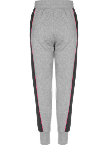 Nike Jogginghose in carbon heather/black/rush pink