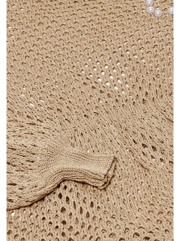 Swirly Strickpullover in Hellbeige