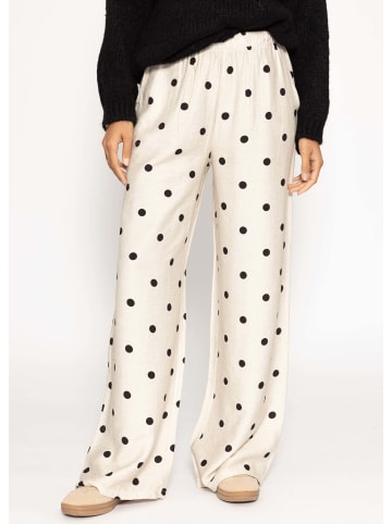 SASSYCLASSY Gepunktete Hose mit weitem Bein in Offwhite