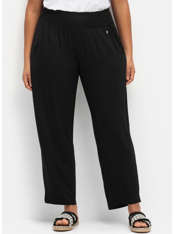 sheego Schlupfhose in schwarz
