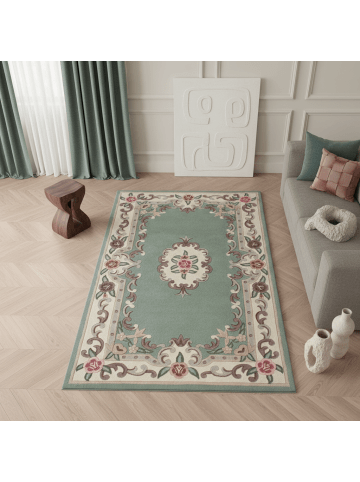 KADIMA DESIGN Traditioneller Wollteppich mit handgeschnitzten Details in Grün-Beige