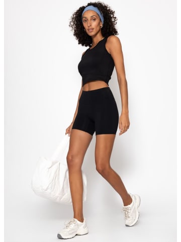SASSYCLASSY Sport-Top mit Leo-Print in Schwarz