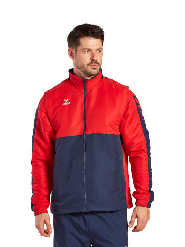 erima Six Wings Jacke mit abnehmbaren Ärmeln in new navy/rot