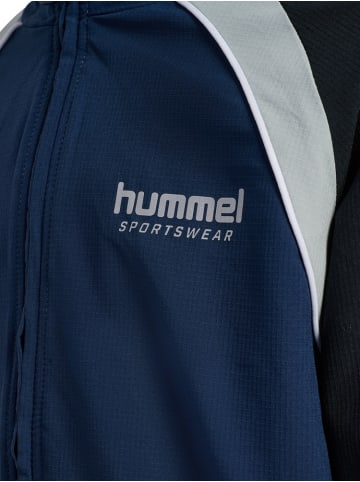 Hummel Kinder Trainingsjacke "Loose Tracksuit Zip Jacket" in Blau