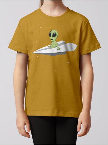 wat? Apparel T-Shirt Alien on a paper plane in Ocker