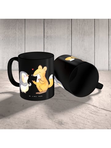 Mr. & Mrs. Panda Keramiktasse Logopädin Superkraft mit Spruch in Schwarz