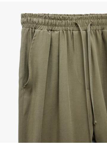 KOTON HOSEN in Khaki