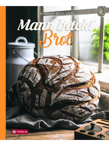 Tyrolia Mann backt Brot