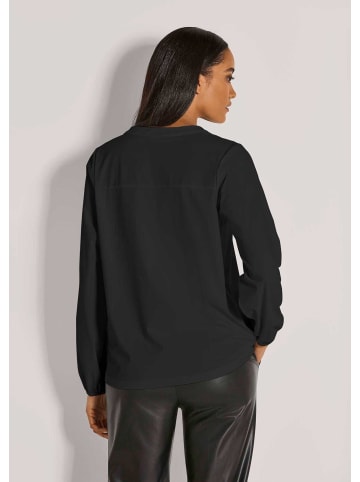 MADELEINE Jerseybluse mit Rundhalsausschnitt in schwarz