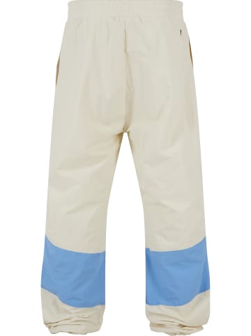 FUBU FUBU Herren FM241-010-2 Fubu Corporate Block Track Pants in creme/light blue
