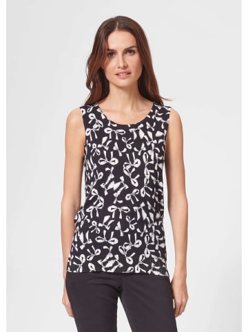 MADELEINE Stricktop mit Schleifen in schwarz / weiß