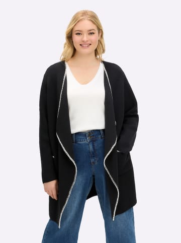 sheego Strickjacke in schwarz-ecru