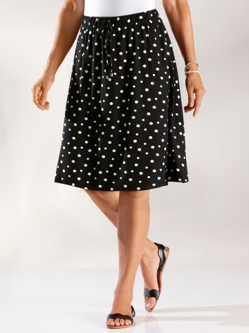 Sieh an! Rock in schwarz-getupft