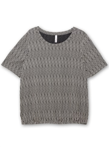 sheego Rundhalsshirt in schwarz-gemustert