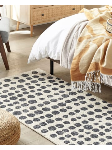 Beliani Geflochtener Teppich HAVRAN in Schwarz/Beige - (W) 80 x (H) 1,5 x (L) 150 cm