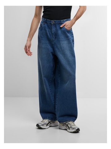 Urban Classics Urban Classics Tapered Heavy Ounce Baggy Jeans in middeepblue