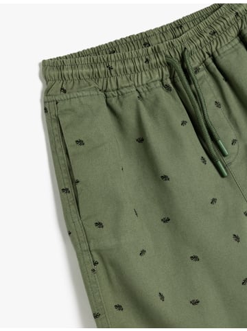 KOTON Shorts in Khaki Gemustert