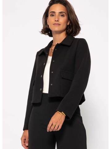 SASSYCLASSY Kurze Jacke mit Druckknöpfen in Schwarz