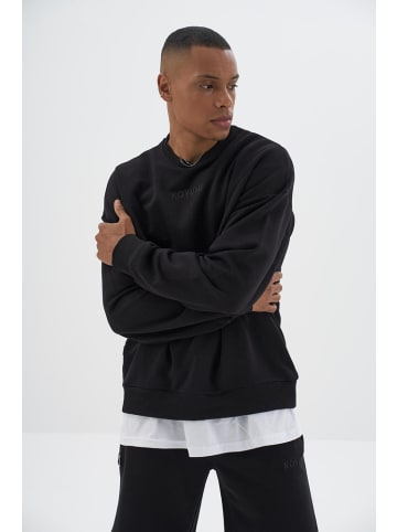 KOYUMI Pullover in Schwarz