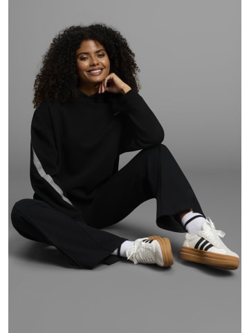 FAYN SPORTS Jogginghose in Schwarz