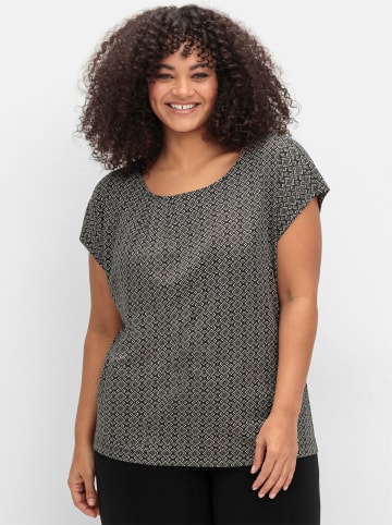 sheego Kurzarmshirt in schwarz-gemustert